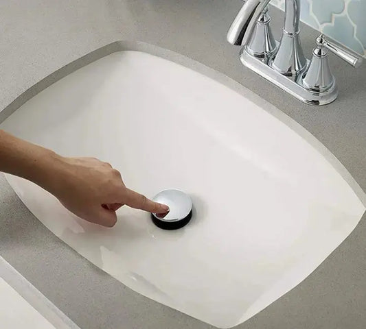 clickwaste wastafelplug in witte wastafel