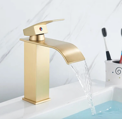 SaniSupreme Bari washbasin tap surface mounted low model wide spout Gold Brushed