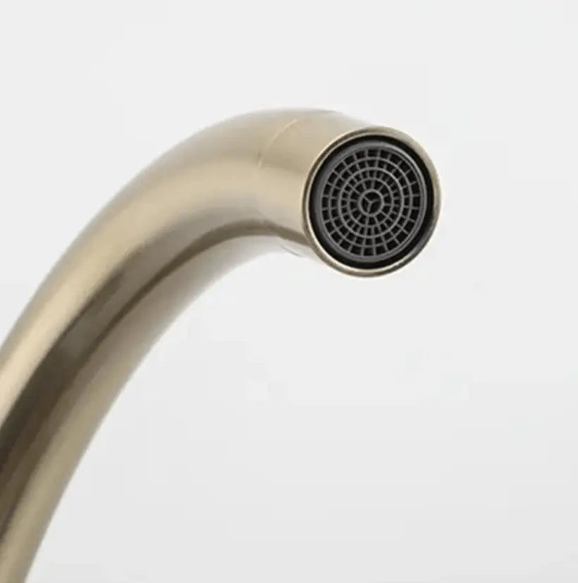 SaniSupreme Wastafel designkraan Nordica opbouw gebogen mengkraan goud geborsteld