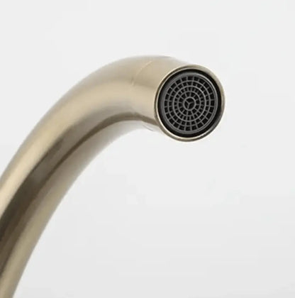 SaniSupreme Wastafel designkraan Nordica opbouw gebogen mengkraan goud geborsteld